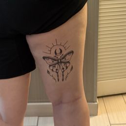 Back of thigh tattoo