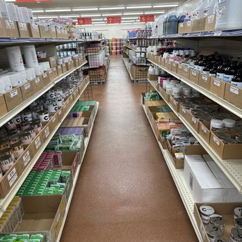 DD Nail Supply - Aisle of some of the products for sale. - Cosmetics & Beauty Supply Near Me - Chicago, Illinois