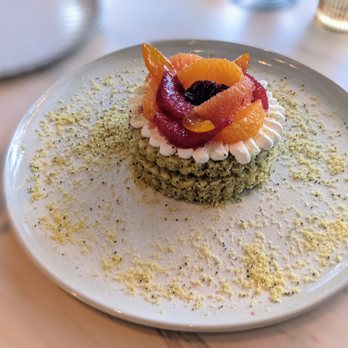 Greywind - a plate of food on a table - Wine Bars Near Me - New York, New York Greywind - a plate of food on a table - Wine Bars Near Me - New York, New York