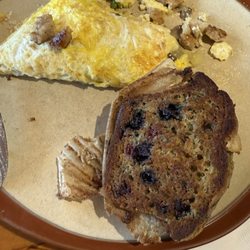 Lydia's Cafe of Wolfeboro - Mushroom jack omelette and grilled blueberry muffin!! Great stuff.