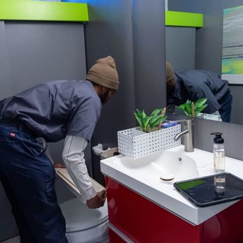 Nixco Plumbing - Tech fixing clogged toilet - Plumbing Near Me - Mason, Ohio Nixco Plumbing - Tech fixing clogged toilet - Plumbing Near Me - Mason, Ohio