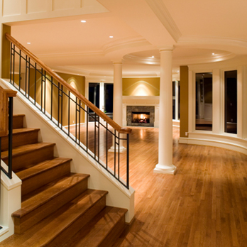 Residential Floors - a staircase leading to a living room - Flooring Near Me Residential Floors - a staircase leading to a living room - Flooring Near Me