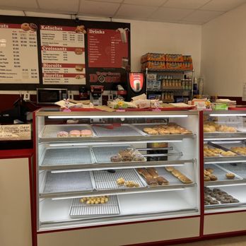 Tasty Cream Donuts - a woman in a bakery - Donuts Near Me - Westwego, Louisiana Tasty Cream Donuts - a woman in a bakery - Donuts Near Me - Westwego, Louisiana