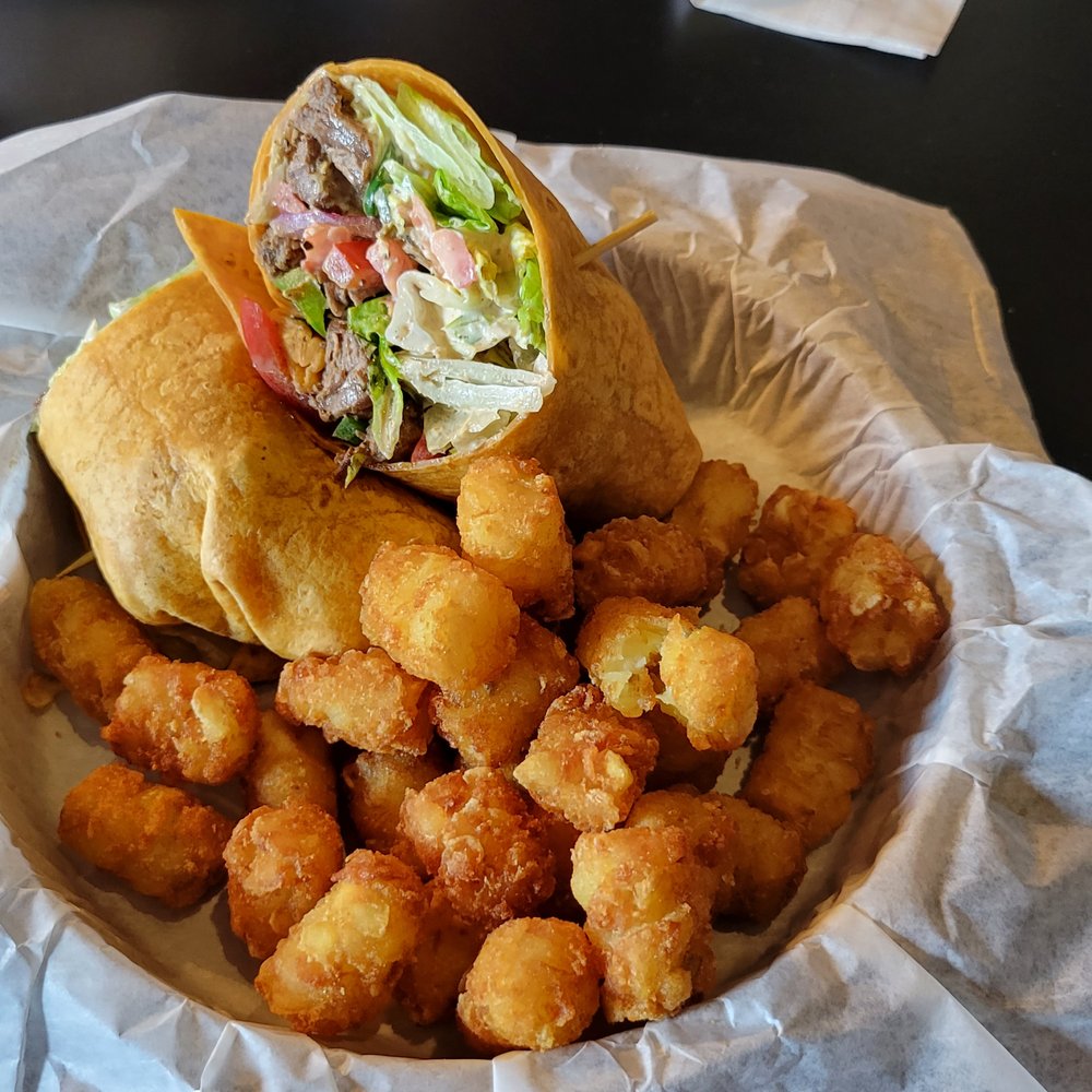 Steak wrap and tots. Steak wrap and tots.