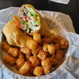 Steak wrap and tots. Steak wrap and tots.
