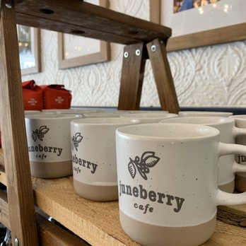 Juneberry Cafe - a row of coffee mugs on a shelf - Breakfast & Brunch Near Me - Taylors Falls, Minnesota Juneberry Cafe - a row of coffee mugs on a shelf - Breakfast & Brunch Near Me - Taylors Falls, Minnesota