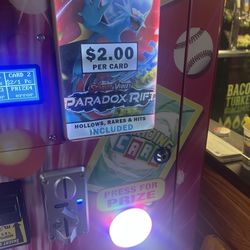 DoubleDave's Pizzaworks - This collectible craze machine in here, specifically Pokemon, don't wast your money, it's filled w/commons on the right side. POS