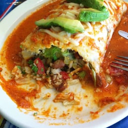 A wet veggie burrito that was ridiculously spicy.
