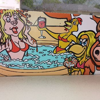 Catfish Station - The decorations on the wall in front of the bar-style seating. - Seafood Near Me - Cypress, Texas