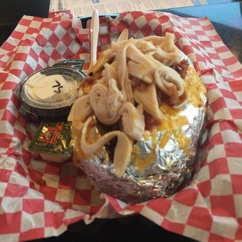 Saxon Pub - Loaded baked potato with turkey - Pubs Near Me - Austin, Texas Saxon Pub - Loaded baked potato with turkey - Pubs Near Me - Austin, Texas