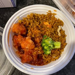 a bowl of rice, broccoli, and chicken a bowl of rice, broccoli, and chicken