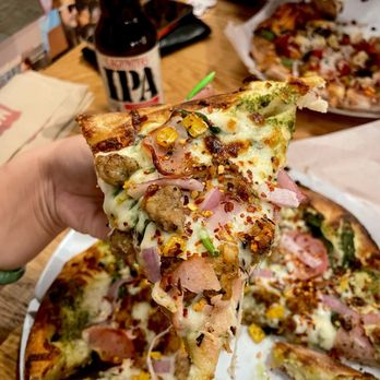 MOD Pizza - Build your own with, mega crust, alfredo/pesto, mozzarella, spinach, spicy chicken, sausage, ham, roasted corn, red onion, oregano. - Pizza Near Me - Fontana, California