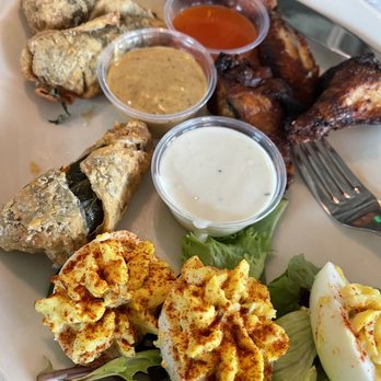 The Pit - I remembered to take the picture of the The Pit Sampler after I ate 1 wing, 1 pimento cheese ball - Barbeque Near Me - Raleigh, North Carolina