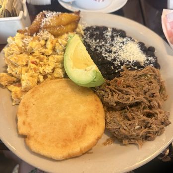 Pastelitos Cafe - Arepa de Carne Mechada (Shredded Beef), plantain - Breakfast & Brunch Near Me - Houston, Texas Pastelitos Cafe - Arepa de Carne Mechada (Shredded Beef), plantain - Breakfast & Brunch Near Me - Houston, Texas