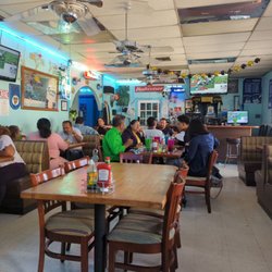 Centroamericana Restaurant - Inside the restaurant. Multiple TVs to watch the saints game. Big portions. Crowded. Everyone speaks Spanish. Good signs