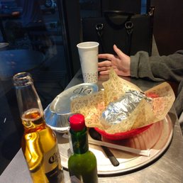 Loaded Barbacoa bourito and a chicken bowl of course let's not forget a window seat with a couple Coronas Loaded Barbacoa bourito and a chicken bowl of course let's not forget a window seat with a couple Coronas