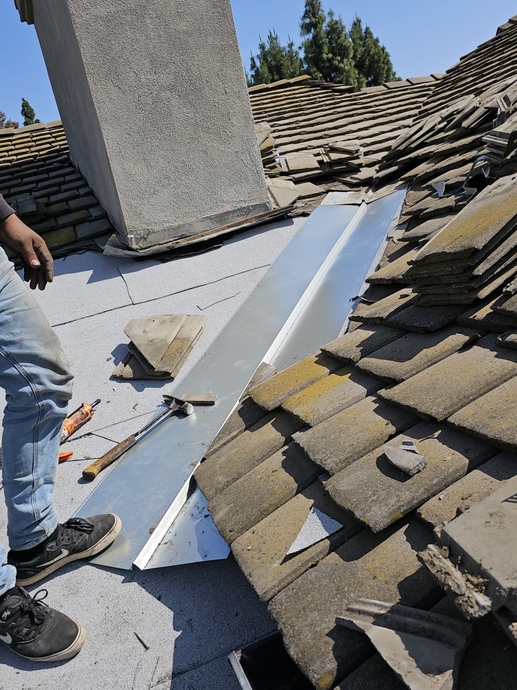 Slide of Juniors Roofing
