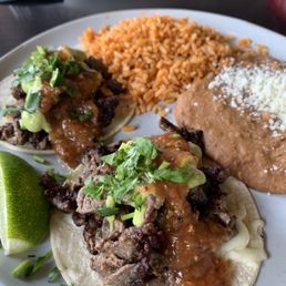 Chimichurri Steak Taco Plate (brunch menu) - phenomenal tacos but rice taste like it was cooked in ketchup (too sweet)