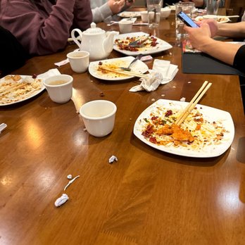 Frying Fish - friends - Szechuan Near Me - Bellevue, Washington