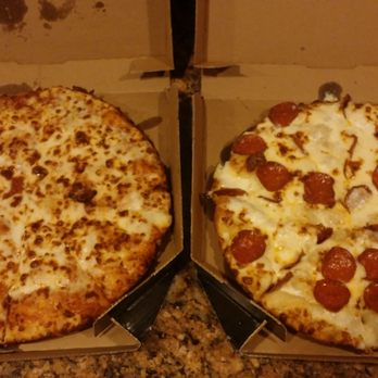 Domino's Pizza - Left, Pan Pizza with extra cheese,. Right, Pan Pizza with garlic Parmesan sauce, and pepperoni. - Pizza Near Me - Randolph, Massachusetts