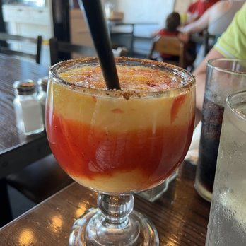 Barrocos Latin Cuisine - Mango margarita.. I'll probably stick with the regular one next time. If you like mango chunks you will like this drink. - Latin American Near Me - Rowlett, Texas