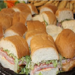 Subs-N-Such - Sandwich, veggie, cookie/brownie trays, as well as 4 foot and 6 foot submarines for your catering needs!