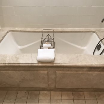 The Hotel Hershey - The sunk in tub. Oh and there is a tv in the bathroom so when you take a bath, you can watch tv!! - Hotels Near Me - Hershey, Pennsylvania
