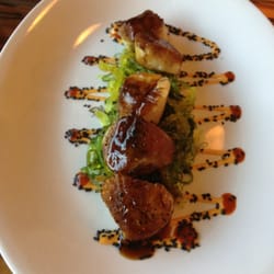 Seared Sea Scallops: seared with sesame seaweed salad, spicy Thai chili aioli & a sweet soy ginger sauce.