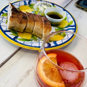 Locanda Amalfi - A starter of delicious bread and drink for 10am breakfast - Italian Near Me - Pleasanton, California Locanda Amalfi - A starter of delicious bread and drink for 10am breakfast - Italian Near Me - Pleasanton, California