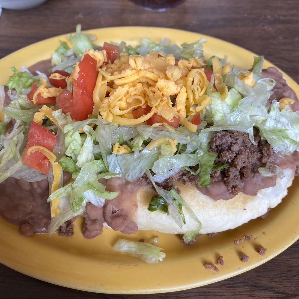 Romo's Cafe - Half a Navajo taco with ground beef - delicious - Mexican Near Me - Holbrook, Arizona Romo's Cafe - Half a Navajo taco with ground beef - delicious - Mexican Near Me - Holbrook, Arizona