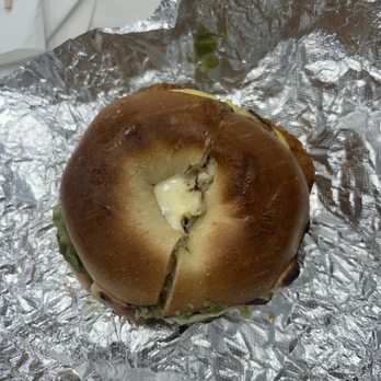 Tracy's Cream & Sugar - breakfast sandy on a plain bagel with egg, american cheese, sausage, hash brown, and avocado! Amazing and came out hot. - Bagels Near Me - Warren, Rhode Island