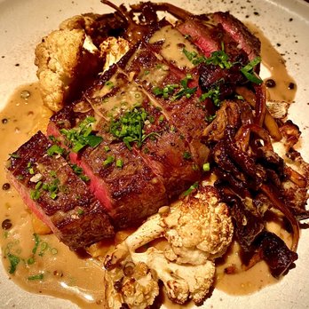 Community Table - Marinated Wagyu Bavette Steak, Creamed Chickpeas, Roasted Cauliflower, Green Peppercorn Sauce, Roasted Yellowfoot Chanterelles - New American Near Me - Washington, Connecticut