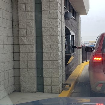 Caribou Coffee - drive thru window in use - Coffee & Tea Near Me - Minot, North Dakota