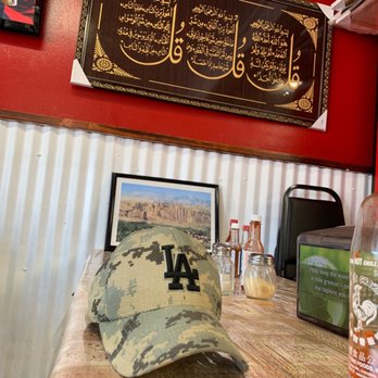 Pizza Depot - a menu and a hat on a table - Pizza Near Me - Sacramento, California Pizza Depot - a menu and a hat on a table - Pizza Near Me - Sacramento, California