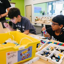 Code Ninjas - Ninjas building their LEGO robots and learning how to program their actions.