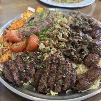 Sofra Grill - Mixed grill- stated serves 2, but definitely enough for 3. Great variety of grilled meats. Came with a large salad - Mediterranean Near Me - South San Francisco, California