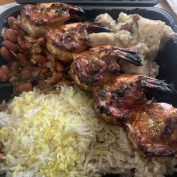 Shrimp kebab plate with half basmati rice and half brown rice, spicy bean salad, and potato salad Shrimp kebab plate with half basmati rice and half brown rice, spicy bean salad, and potato salad