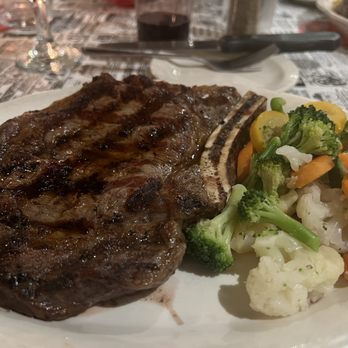Backwoods Inn - Bone-in Ribeye Steak (18oz) with sautéed veggies in garlic and white wine. Veggies were amazing, but the twice baked potato is to die for!! - Steakhouses Near Me - Santa Clarita, California Backwoods Inn - Bone-in Ribeye Steak (18oz) with sautéed veggies in garlic and white wine. Veggies were amazing, but the twice baked potato is to die for!! - Steakhouses Near Me - Santa Clarita, California