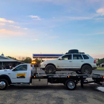 Snoork Towing - Porsche being towed by Snoork Towing in Stallings, NC. - Towing Near Me - Monroe, North Carolina Snoork Towing - Porsche being towed by Snoork Towing in Stallings, NC. - Towing Near Me - Monroe, North Carolina