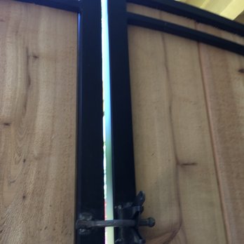 Emanuel's Wrought Iron - Latch just welded on (painted again after finish). Again, the clean looking back of gate. - Fences & Gates Near Me