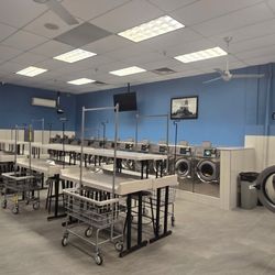 New Bridge Laundromat - New Bridge Laundromat folding tables after the late 2025 full renovation.