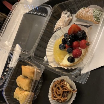 Baklovah Bakery - Walnut 1/2 lb. Baklava, mini turtle cheesecake, fruit tart, and mini cannolis with chocolate and pistachio. - Desserts Near Me - San Antonio, Texas
