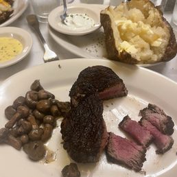 Filet Mignon* (14 oz), Sauteed Mushrooms, baked potato, sour cream. Filet Mignon* (14 oz), Sauteed Mushrooms, baked potato, sour cream.