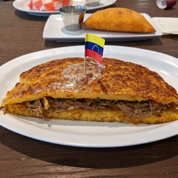 Pabellon - Cachapa - order this!!! Fried corn cake that is crispy and butter on the outside and soft on the inside. Split this. - Mexican Near Me - Pittsburgh, Pennsylvania