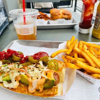 Dog Haus Biergarten - Four Points - Dinner for 2...T-Mex with regular fries and cheeseburger with sweet potato fries. - Burgers Near Me - Austin, Texas Dog Haus Biergarten - Four Points - Dinner for 2...T-Mex with regular fries and cheeseburger with sweet potato fries. - Burgers Near Me - Austin, Texas