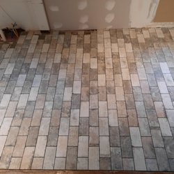Jay Contracting - Cobble tile for kitchen floor.