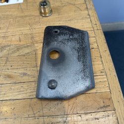 Red Rocks Locksmith Denver - The plate that the owner decided to not reinstall and the broken lock lacking the spin plate.
