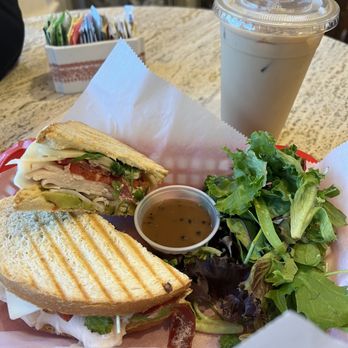 The Daily Bean - Avocado Hummus Turkey Club with green salad Vanilla iced latte - Coffee & Tea Near Me - Vernon Township, New Jersey
