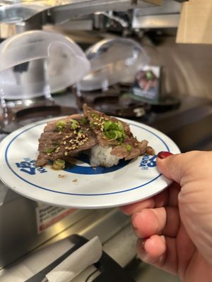 Kura Revolving Sushi Bar by null