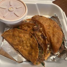 Birria tacos with consume Birria tacos with consume